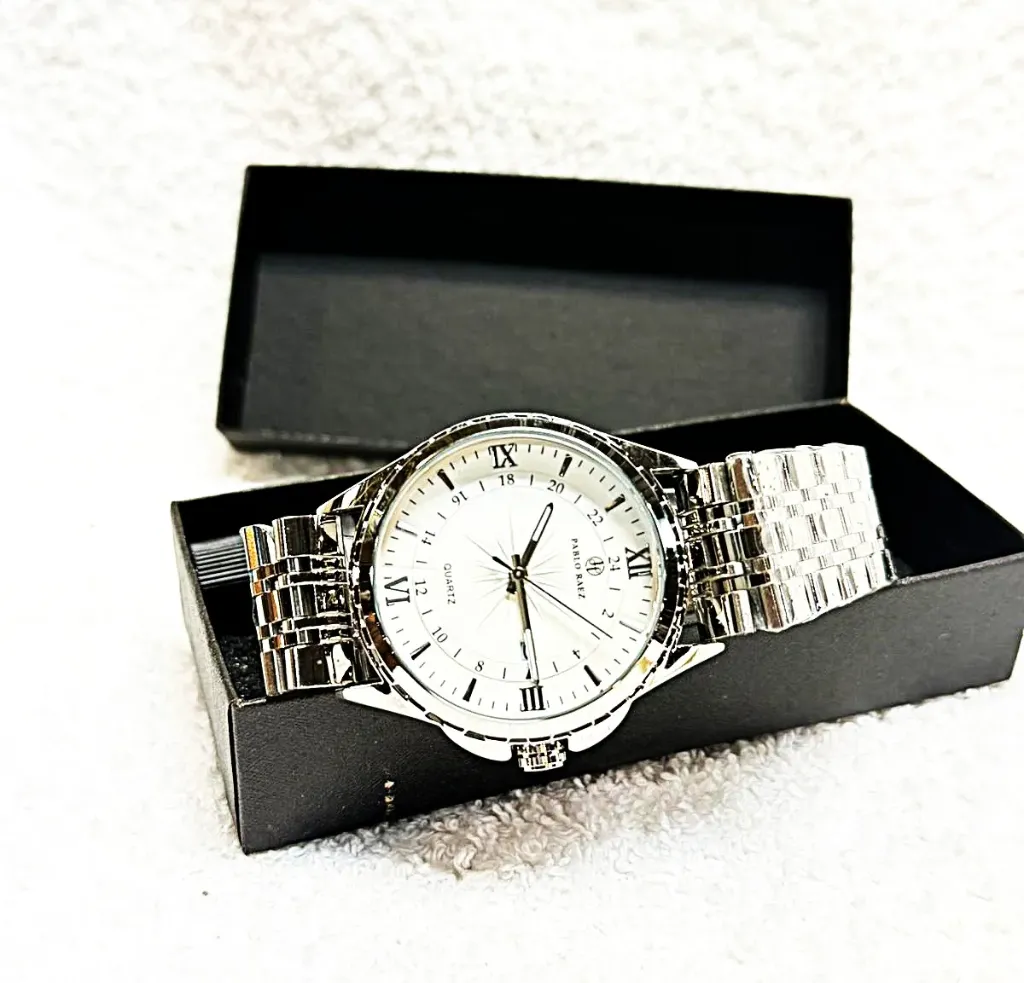 Pablo Raez wristwatch made of silver-colored stainless steel with a white dial