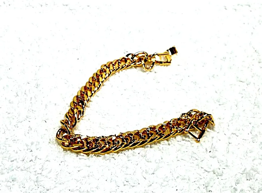 Gold chain bracelet with curb links