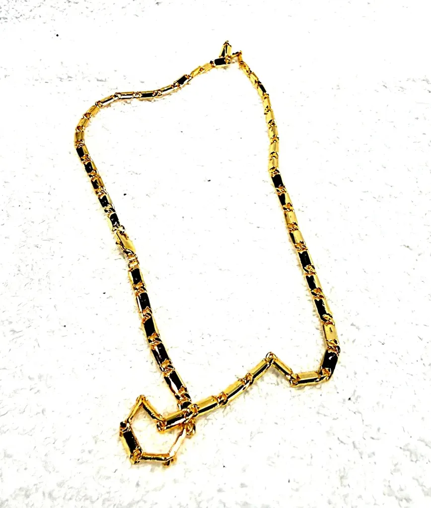 Black and gold plastic pearl necklace